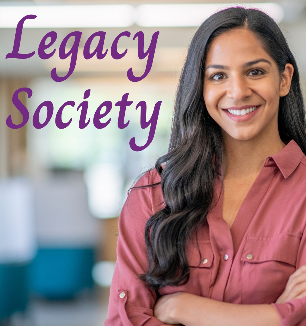 A woman faces the camera, the background behind her is blurred, and the words "Legacy Society" appear on screen