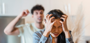 A blurry image of a man and woman in a controlling relationship A blurry image of a man and woman in a controlling relationship